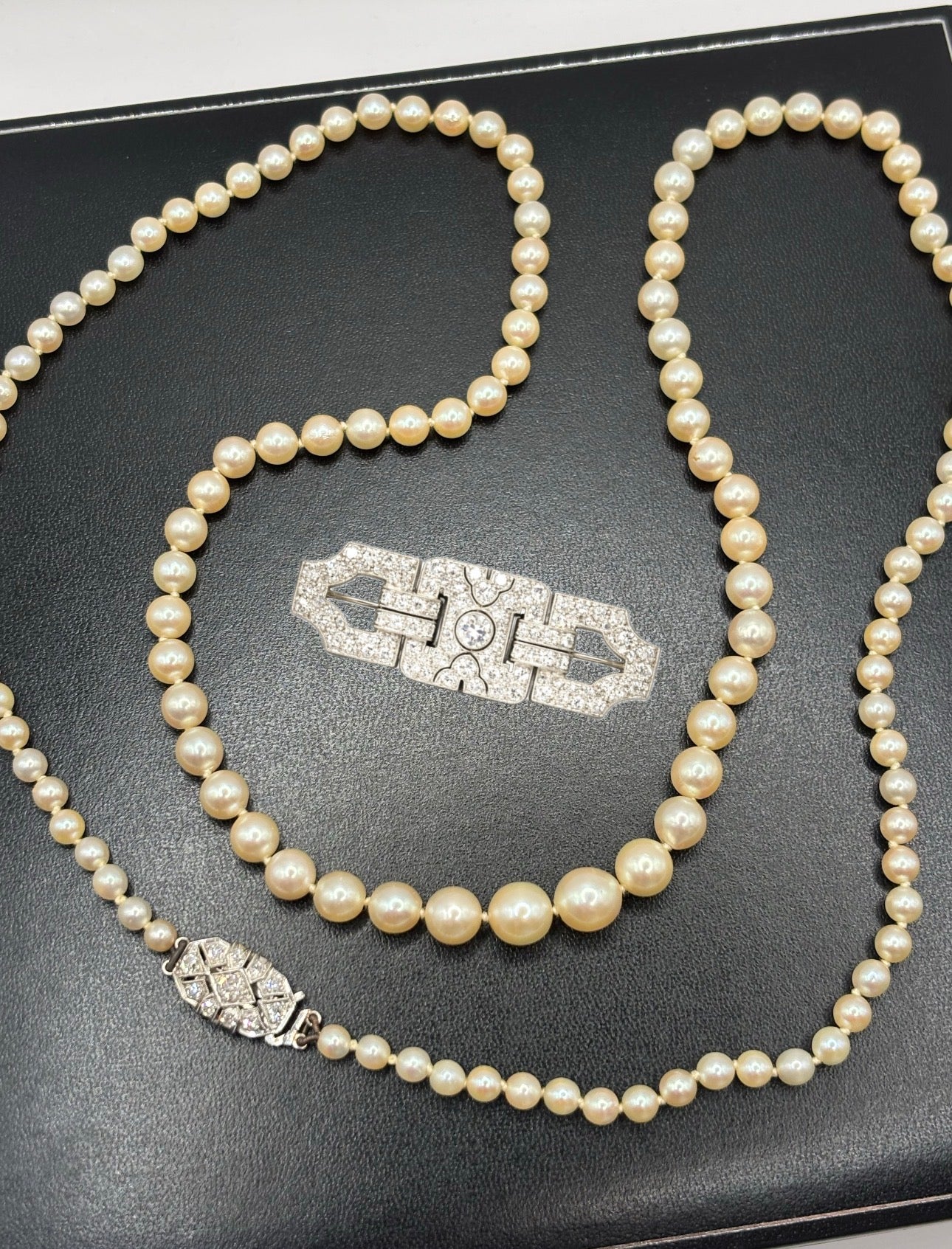 Art Deco Graduated Akoya Pearl Necklace with Diamond Platinum Clasp, circa 1925