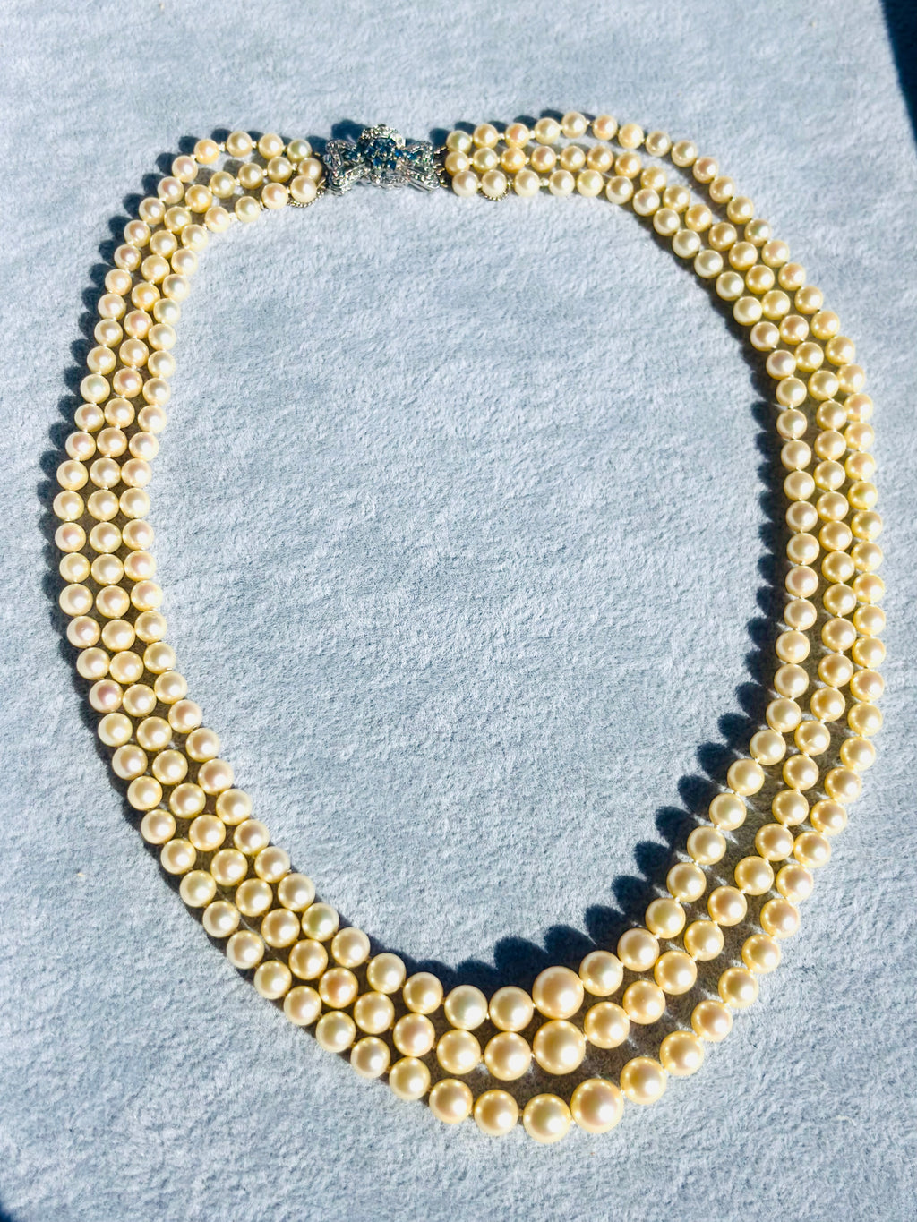 Vintage Triple-Strand Cultured Akoya Pearl Necklace 18K Carat Diamond Sapphire Bow Clasp, Circa 1960’s