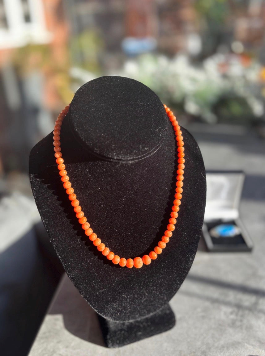 EARLY 20th CENTURY CORAL Bead Necklace, with 9ct gold clasp.