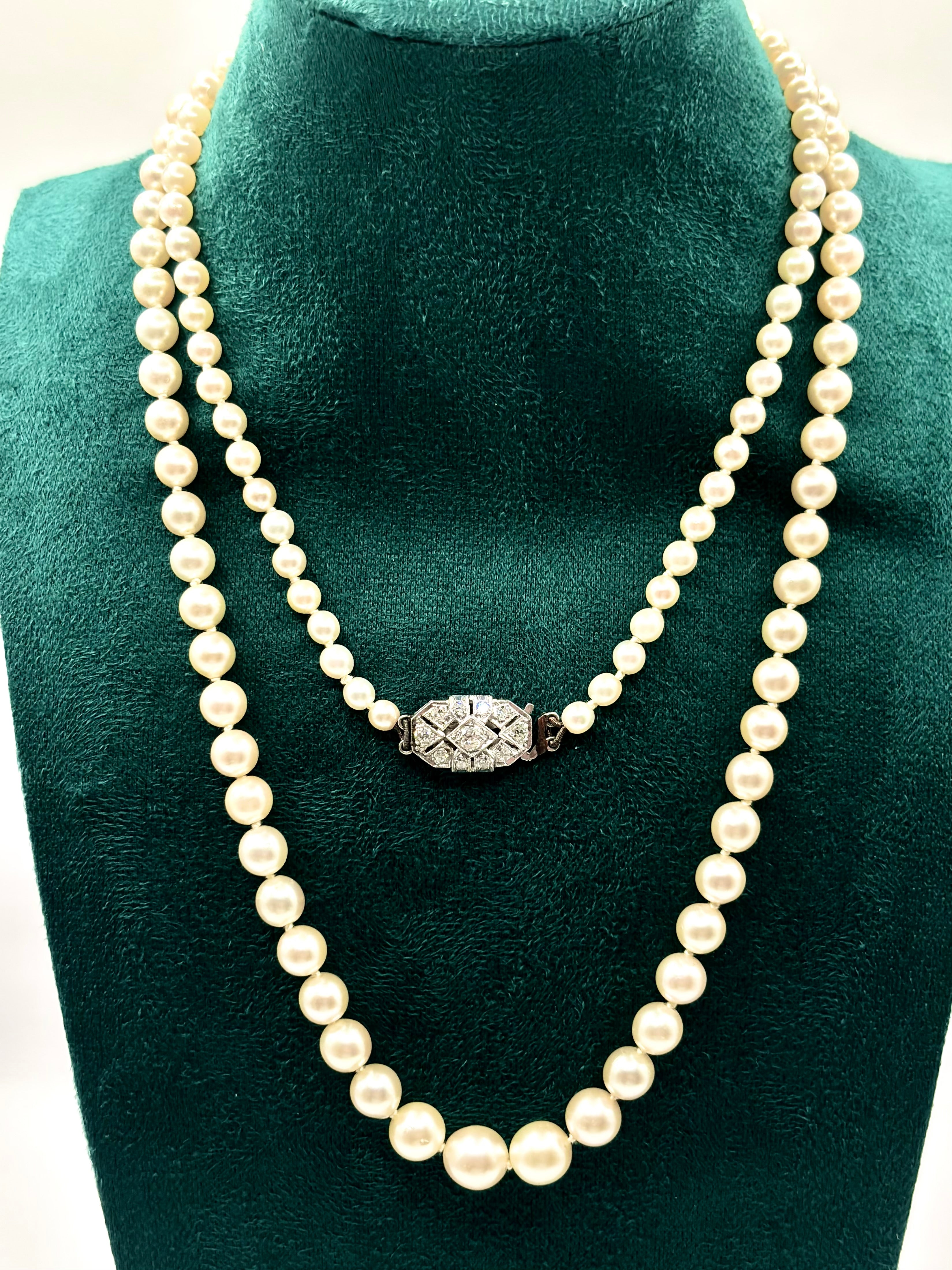 Art Deco Graduated Akoya Pearl Necklace with Diamond Platinum Clasp, circa 1925