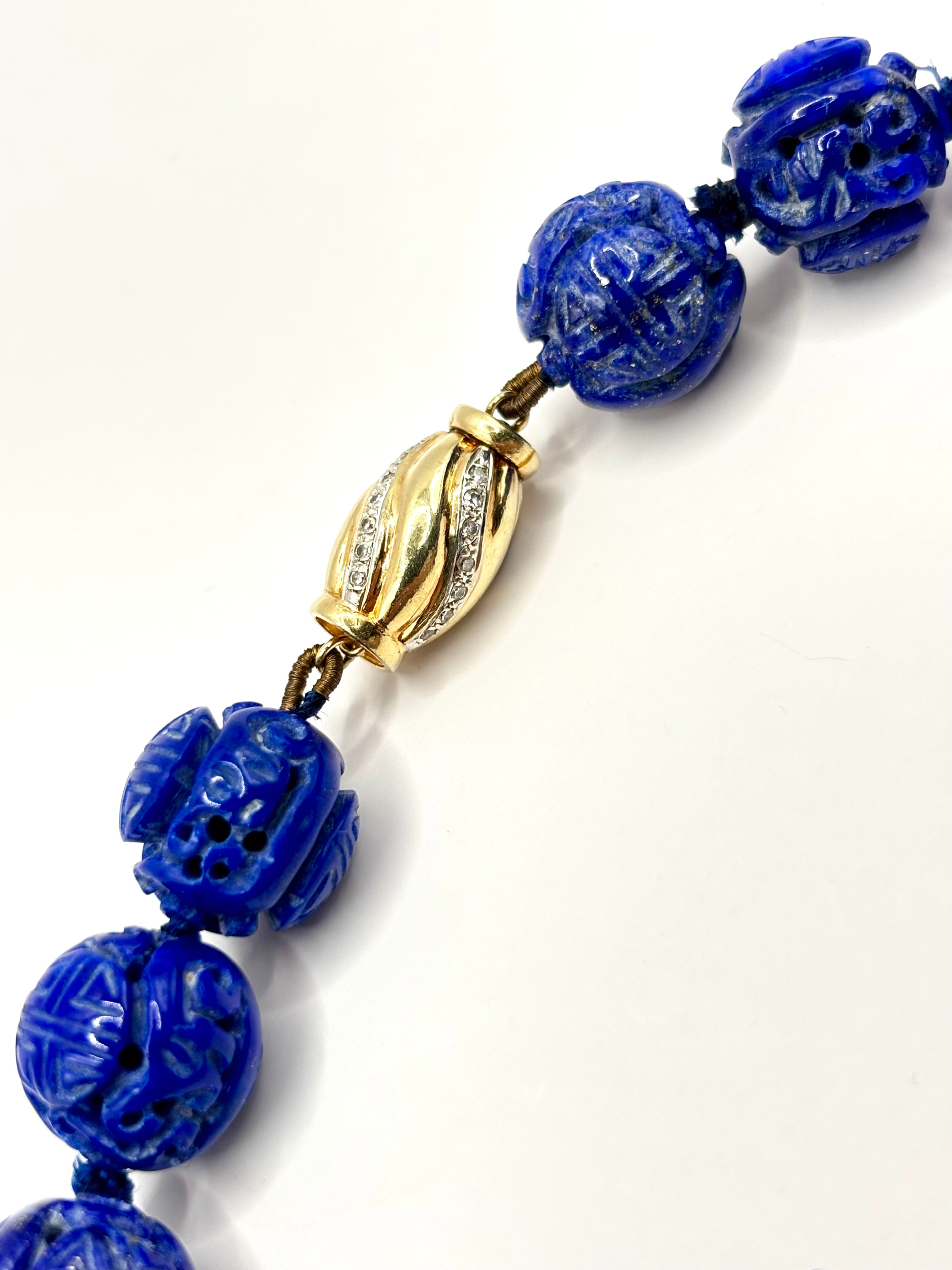 Vintage Carved Lapis Lazuli Bead Necklace with Diamond Set 14 Karat Gold Clasp