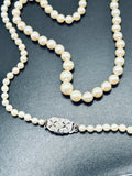 Art Deco Graduated Akoya Pearl Necklace with Diamond Platinum Clasp, circa 1925