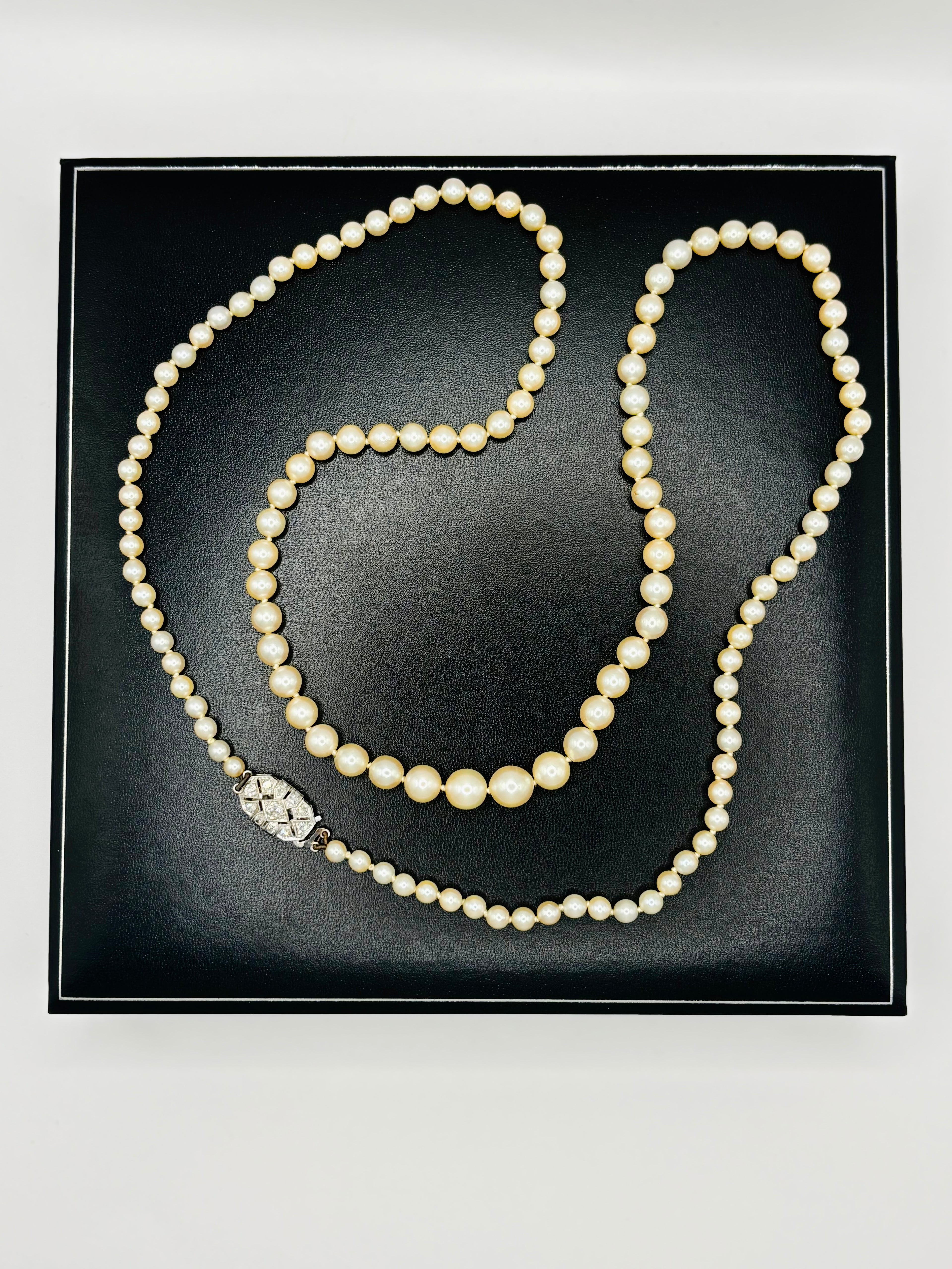Art Deco Graduated Akoya Pearl Necklace with Diamond Platinum Clasp, circa 1925