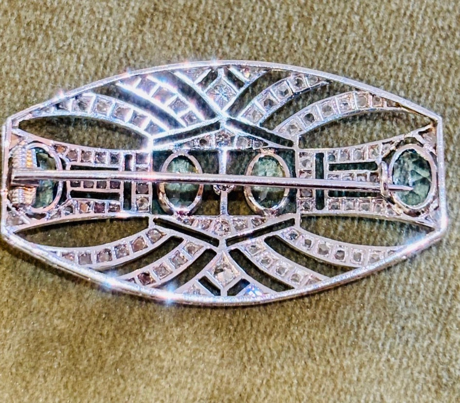 ART DECO PLATINUM, 18K Gold, Diamonds and Aquamarines Brooch c1920’s
