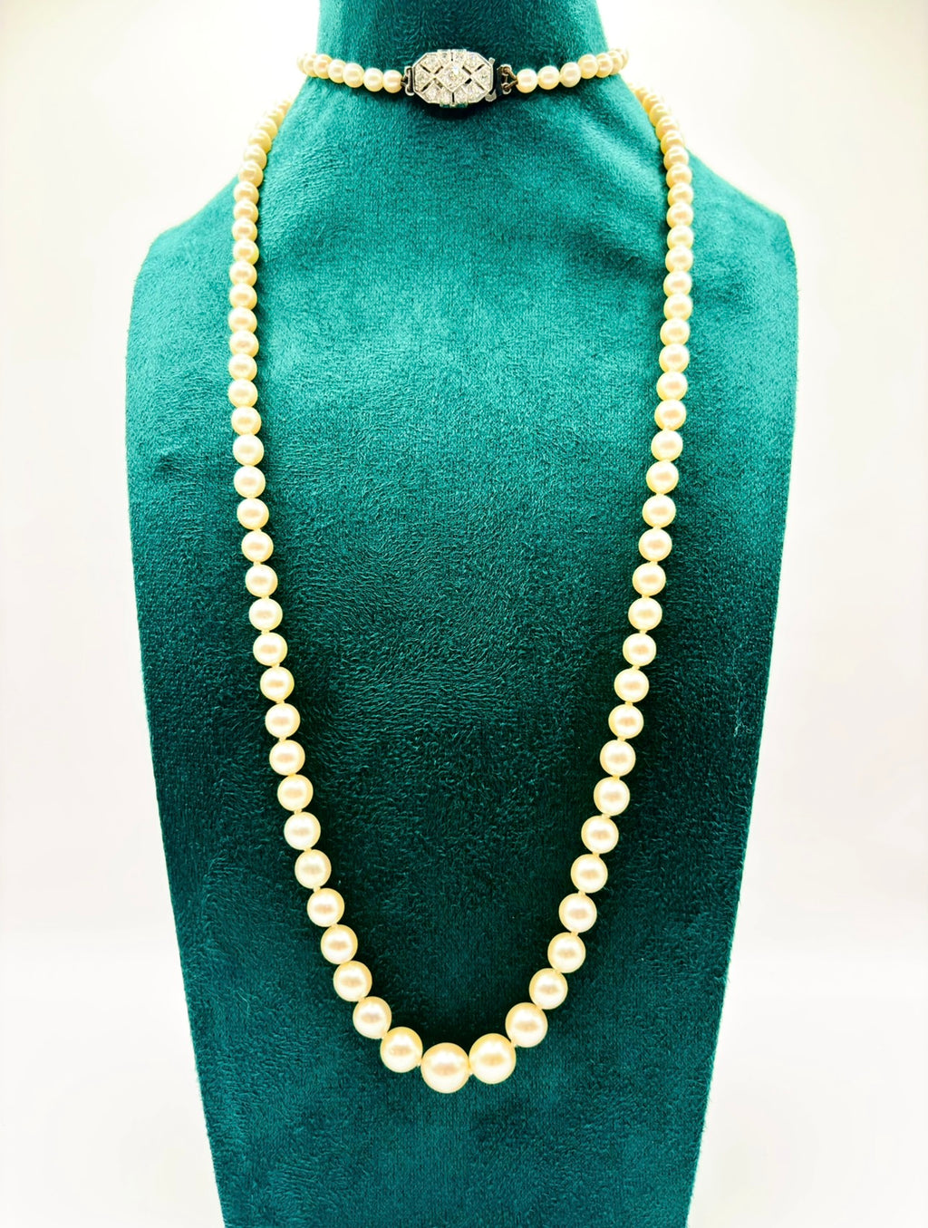 Art Deco Graduated Akoya Pearl Necklace with Diamond Platinum Clasp, circa 1925
