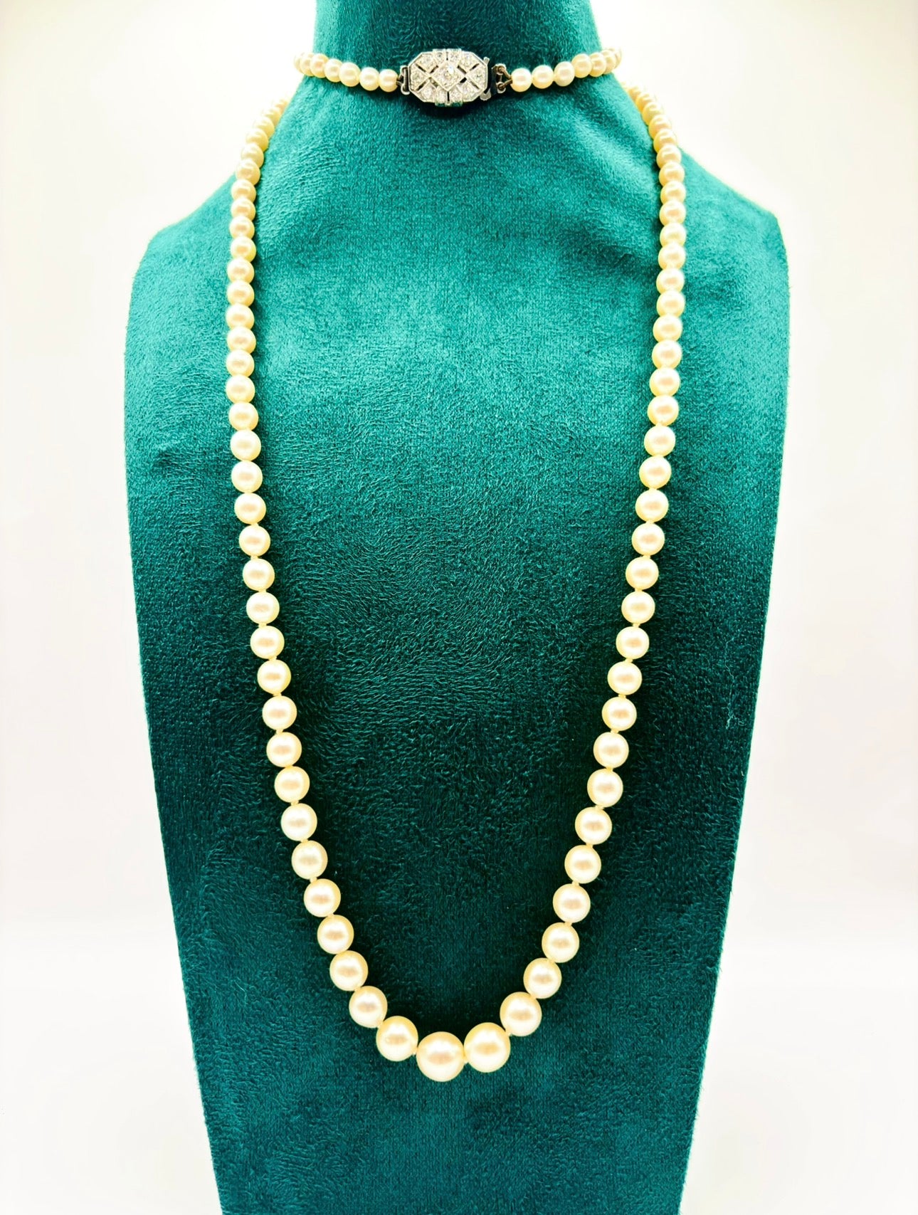 Art Deco Graduated Akoya Pearl Necklace with Diamond Platinum Clasp, circa 1925