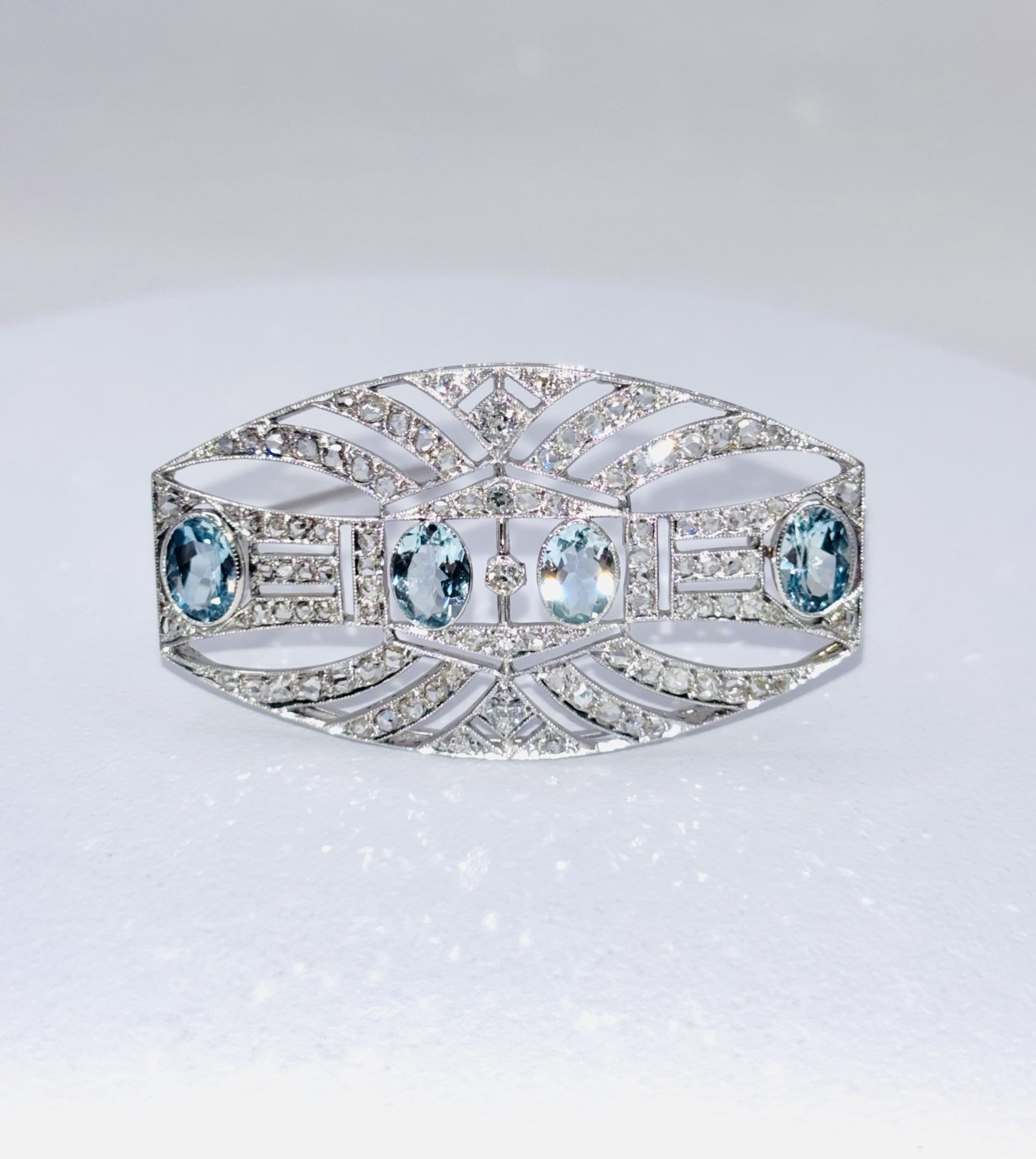 ART DECO PLATINUM, 18K Gold, Diamonds and Aquamarines Brooch c1920’s