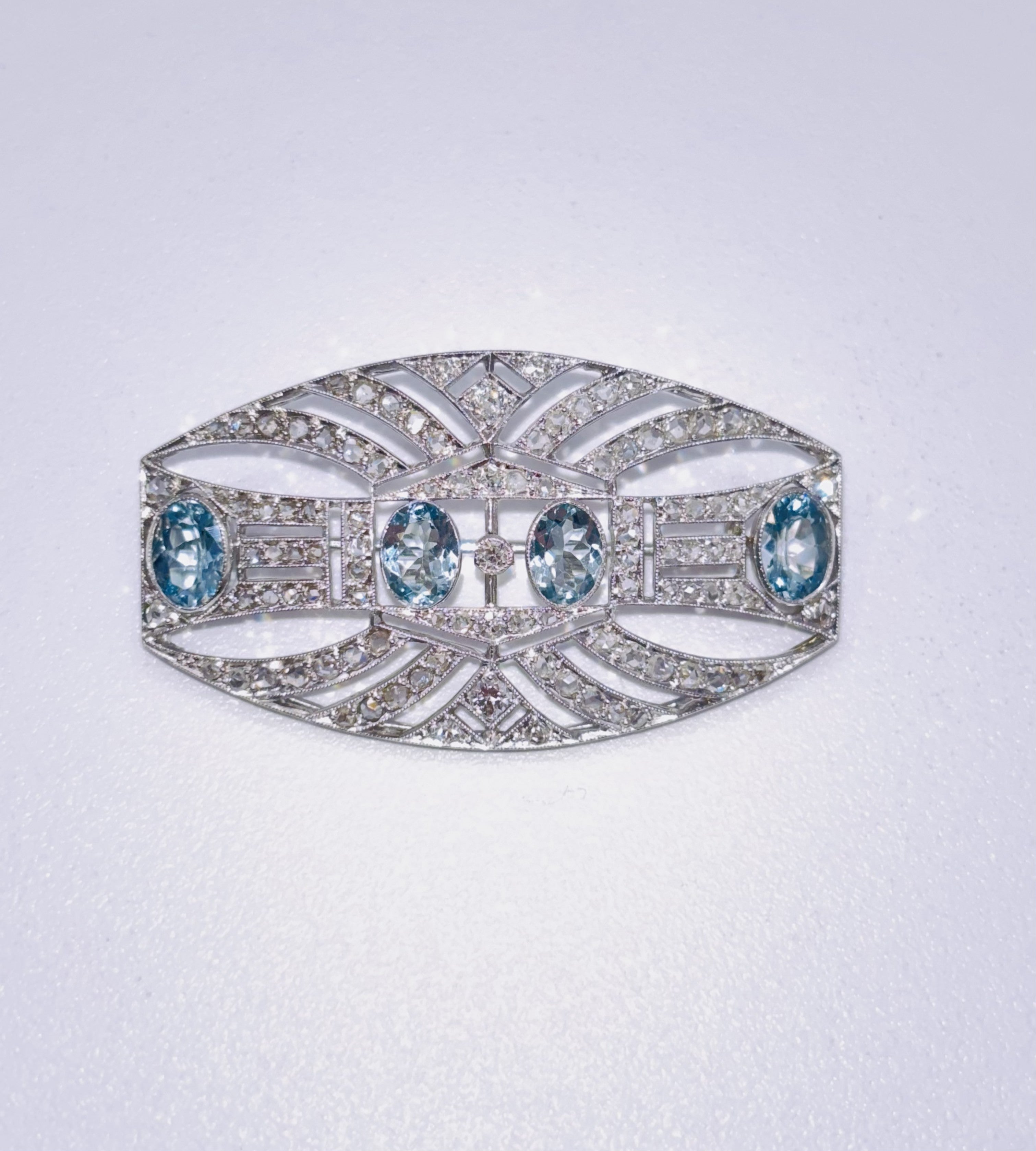 ART DECO PLATINUM, 18K Gold, Diamonds and Aquamarines Brooch c1920’s