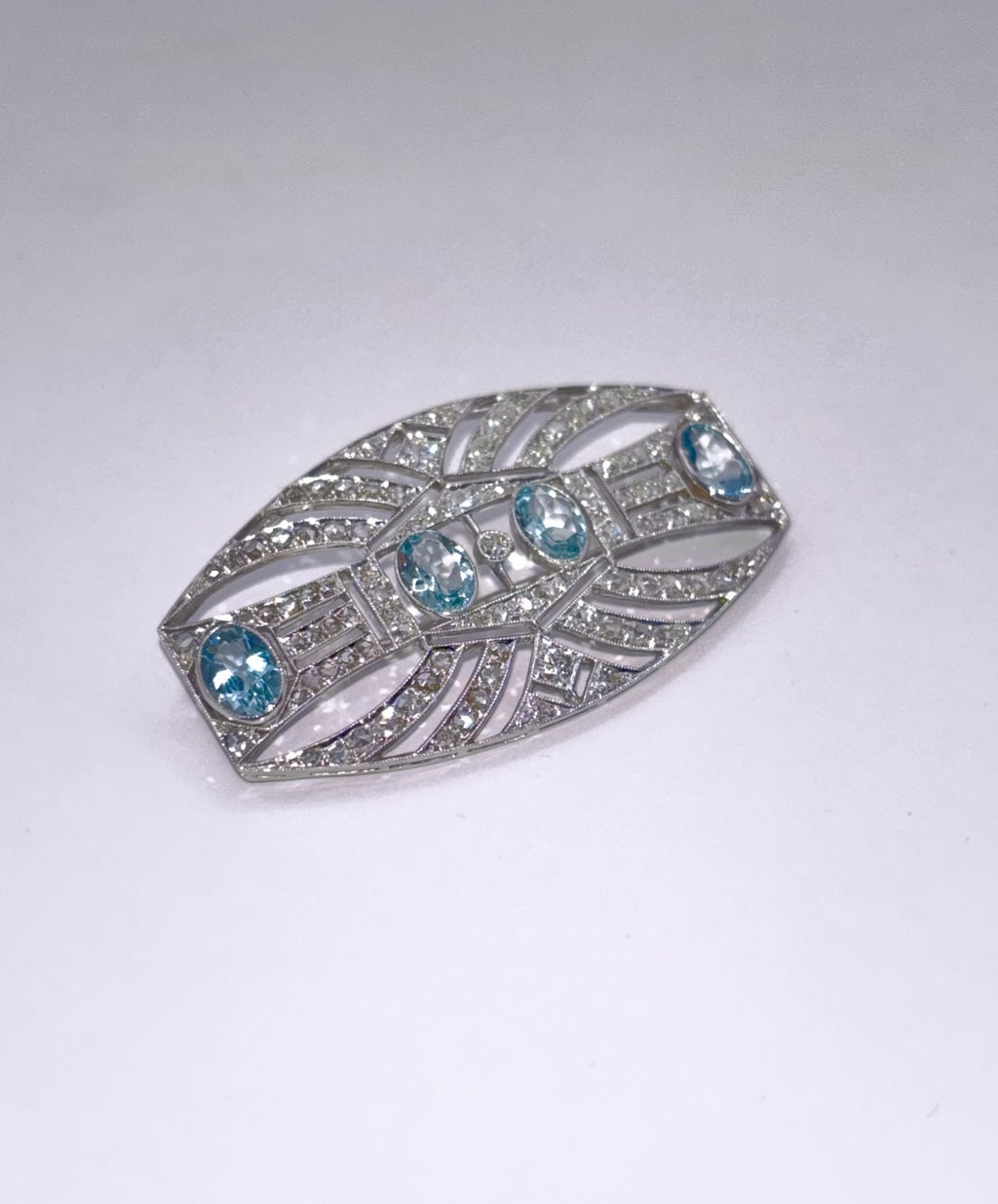 ART DECO PLATINUM, 18K Gold, Diamonds and Aquamarines Brooch c1920’s