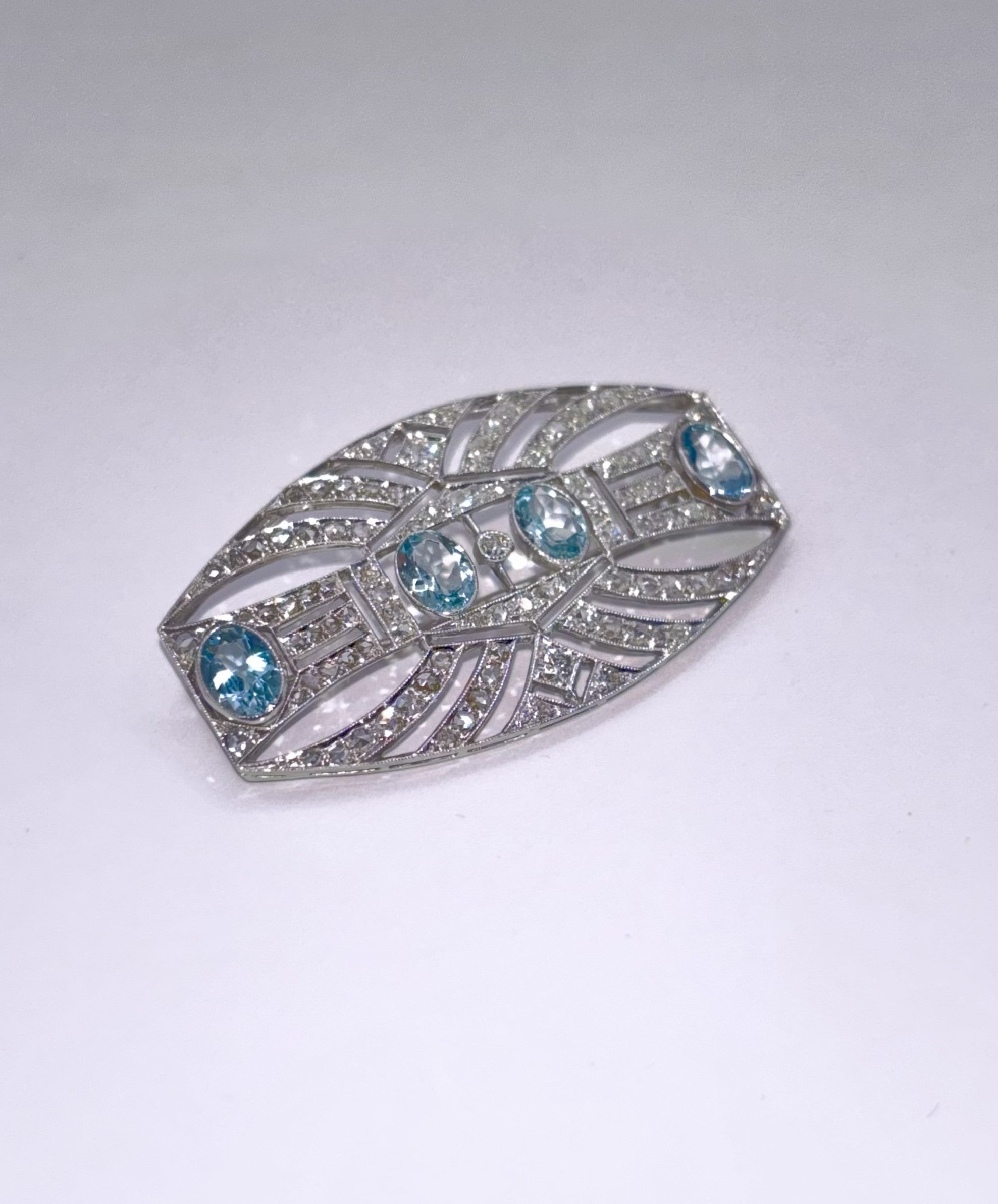 ART DECO PLATINUM, 18K Gold, Diamonds and Aquamarines Brooch c1920’s