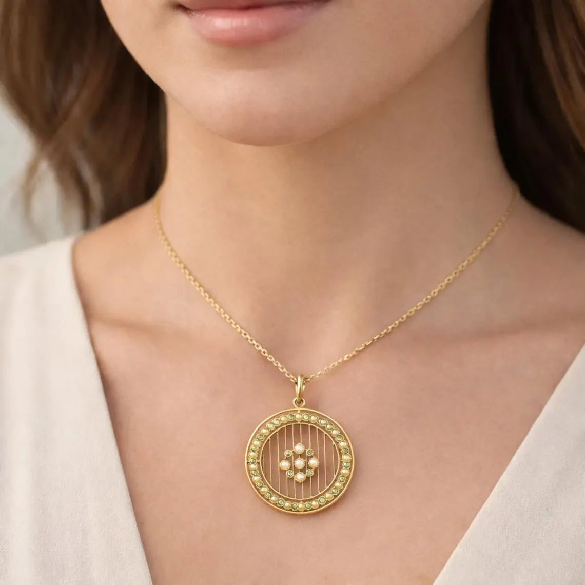 Edwardian 15ct Gold Peridot Seed Pearl Openwork Pendant, circa 1905 (18K Chain)